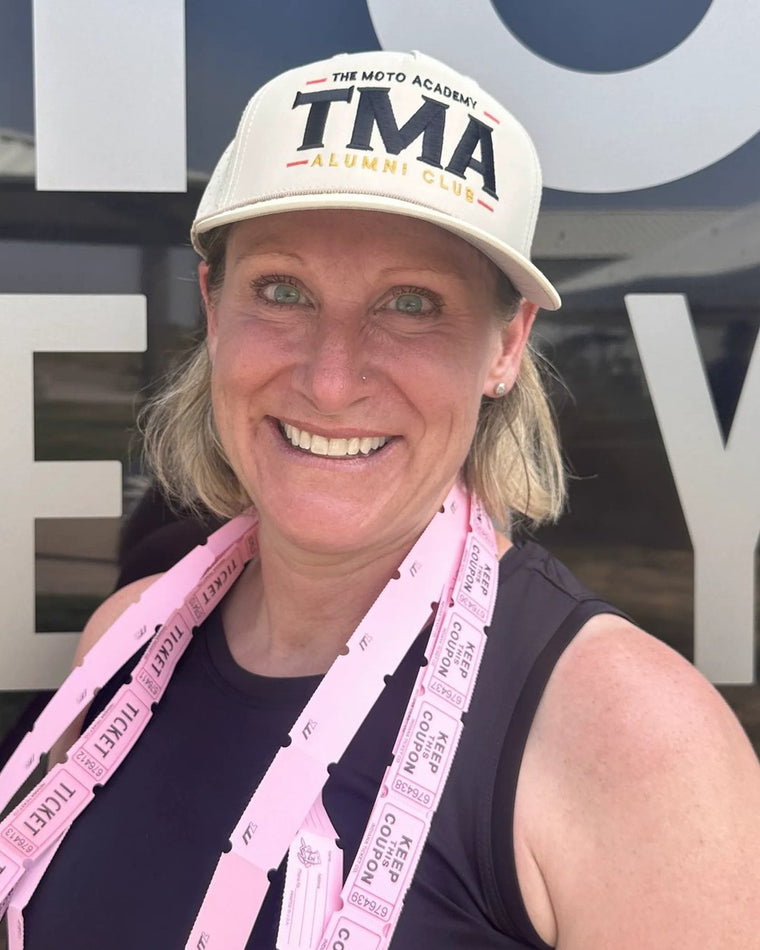 Rider wearing The Moto Academy Alumni Club hat at camp
