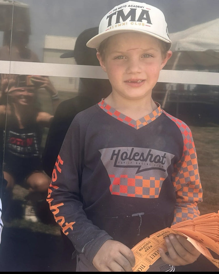 Rider wearing The Moto Academy Alumni Club hat at camp